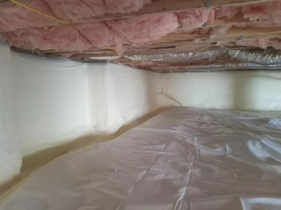 Crawl space encapsulation with closed-cell spray foam for Storm Damage Roof Repair in Highland Park